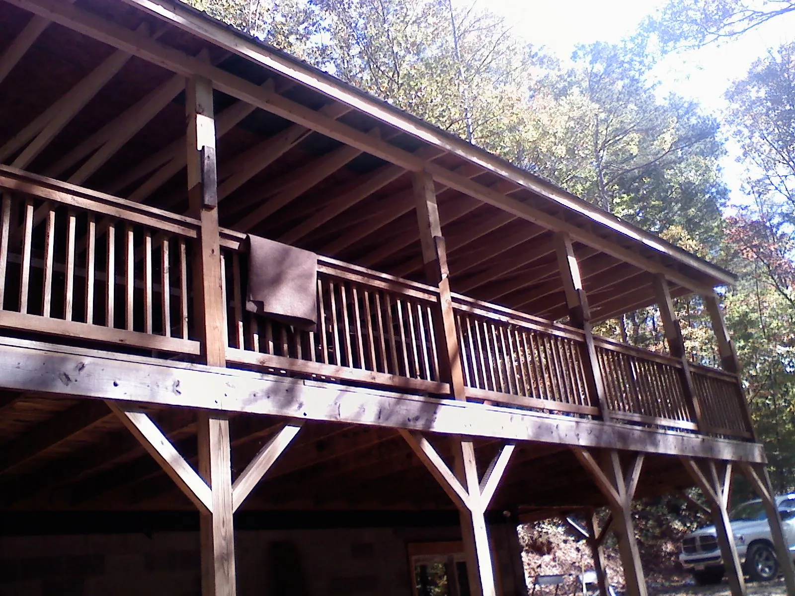 Timber framing under a new elevated porch and deck — Roof Leak Repair in Franconia by Roofing Brothers